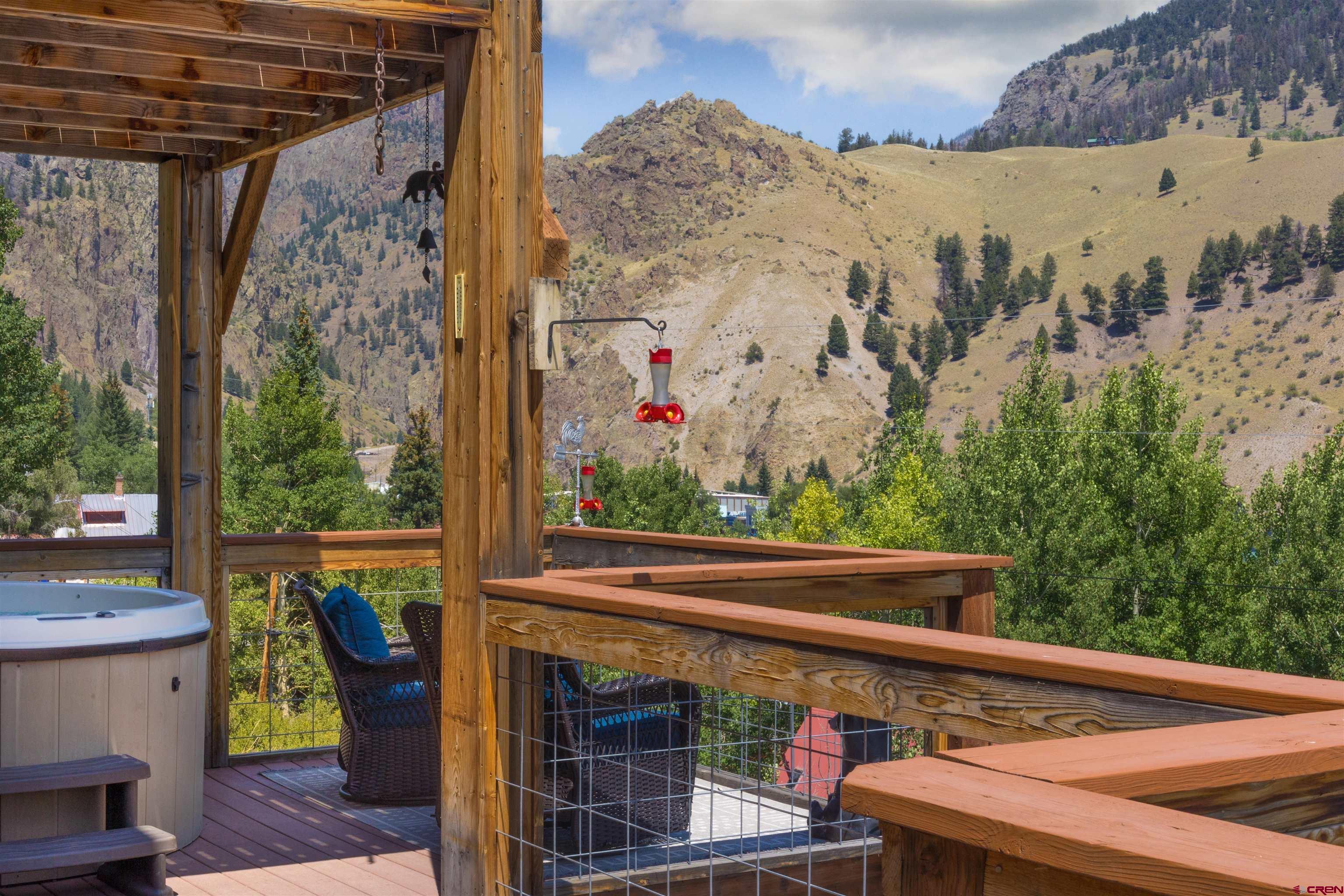 301 West 3rd Street Creede, CO 81130 - Photo 25 of 28 a view of a balcony with chairs