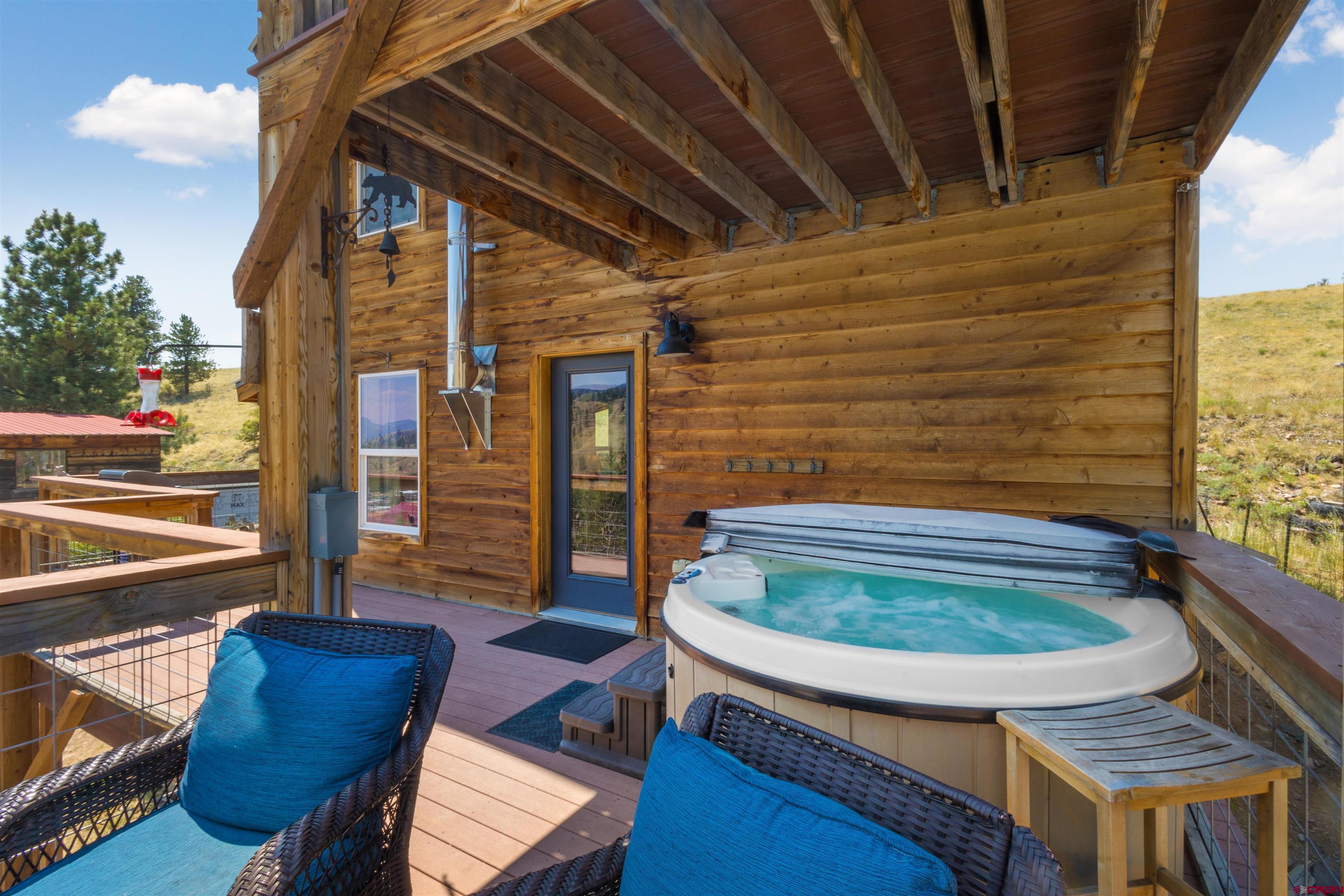 301 West 3rd Street Creede, CO 81130 - Photo 27 of 28 a view of a balcony with chairs