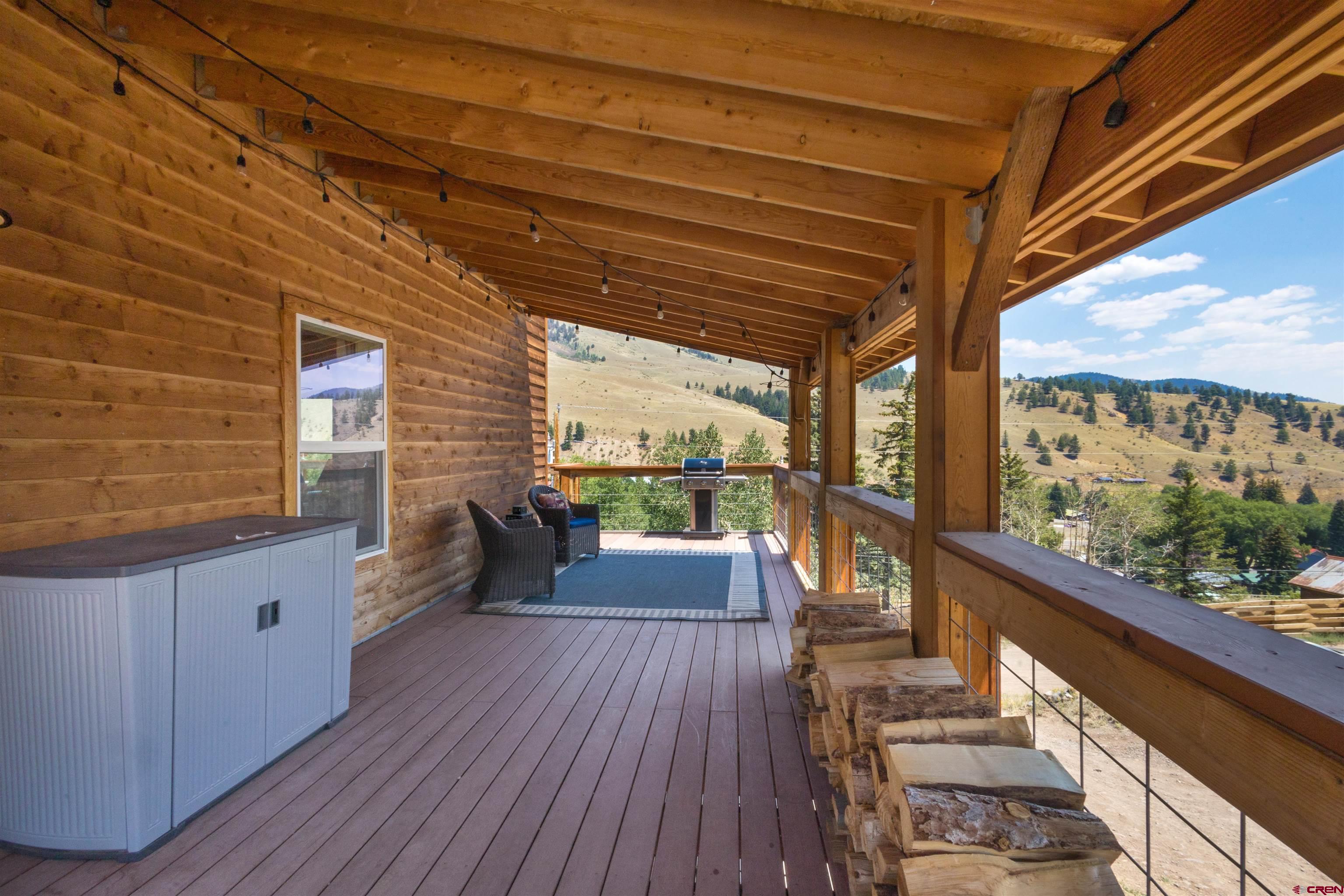 301 West 3rd Street Creede, CO 81130 - Photo 28 of 28 a balcony with wooden floor