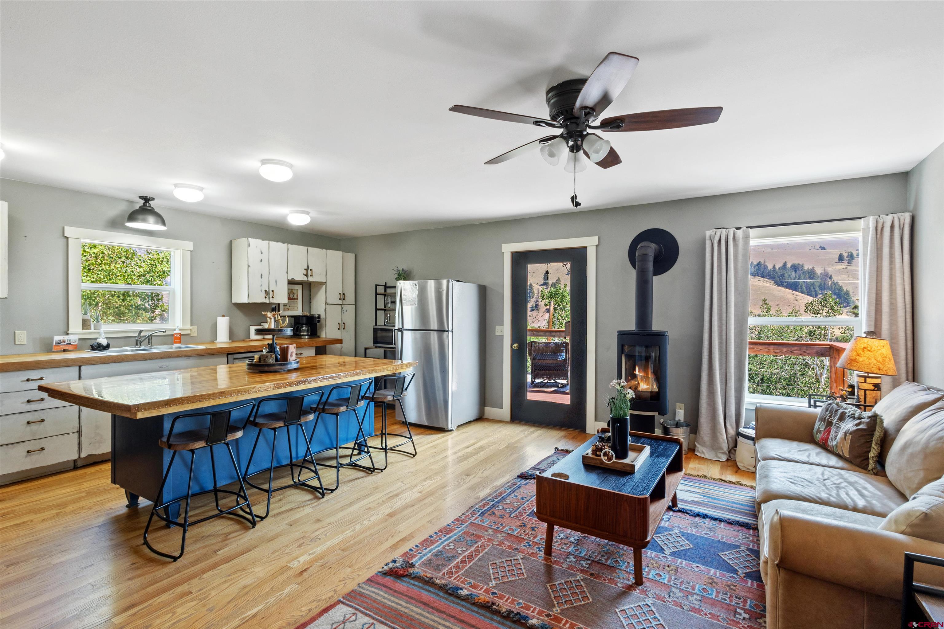 301 West 3rd Street Creede, CO 81130 - Photo 6 of 28 a living room with furniture and wooden floor