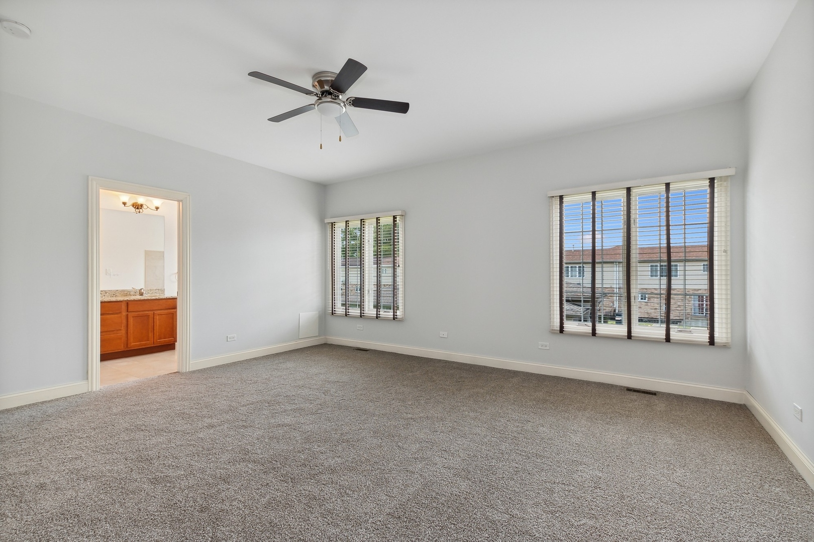 10028 South Roberts Road Palos Hills, IL 60465 - Photo 11 of 15 a view of an empty room with a window
