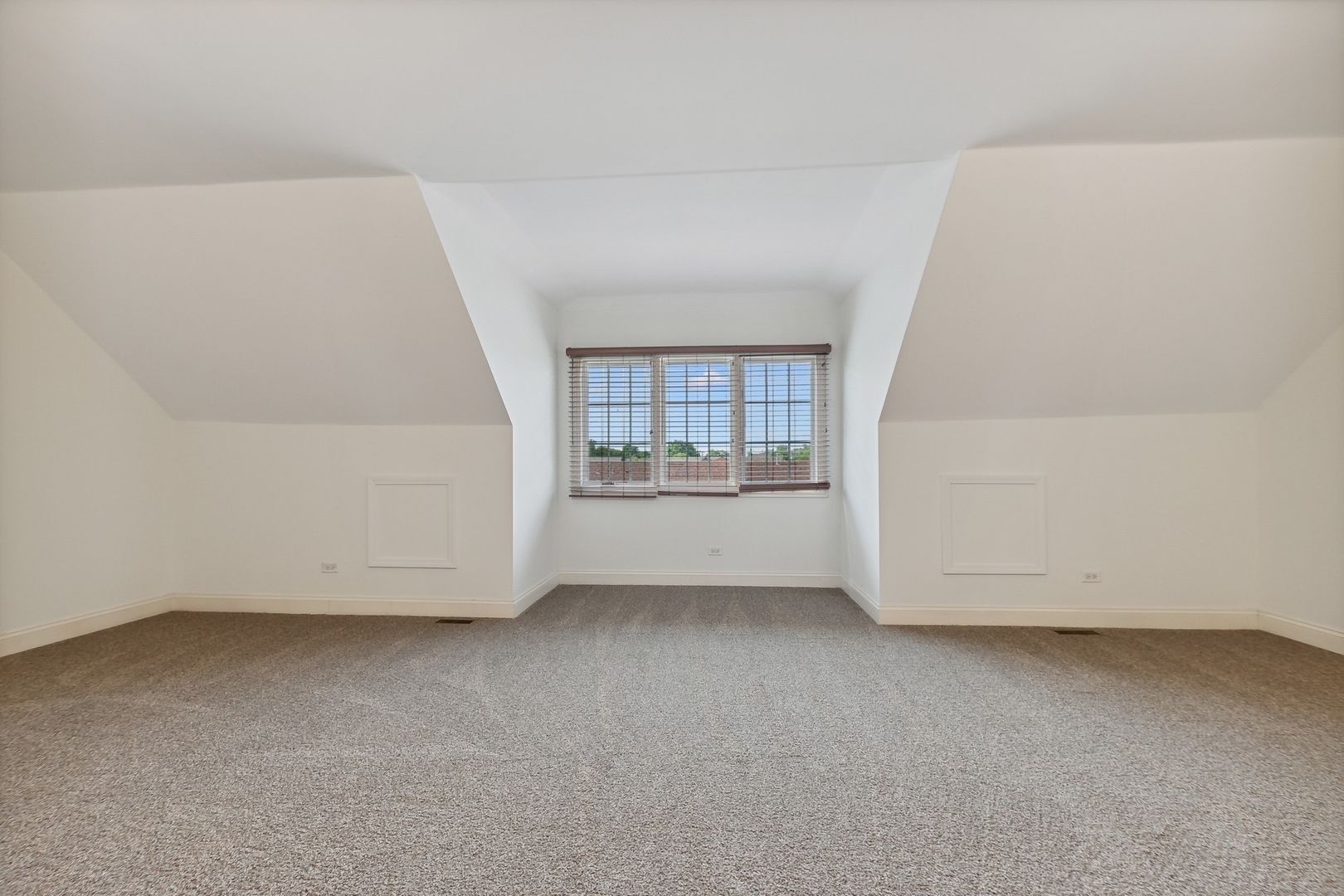 10028 South Roberts Road Palos Hills, IL 60465 - Photo 12 of 15 an empty room with a white cabinet and a oven