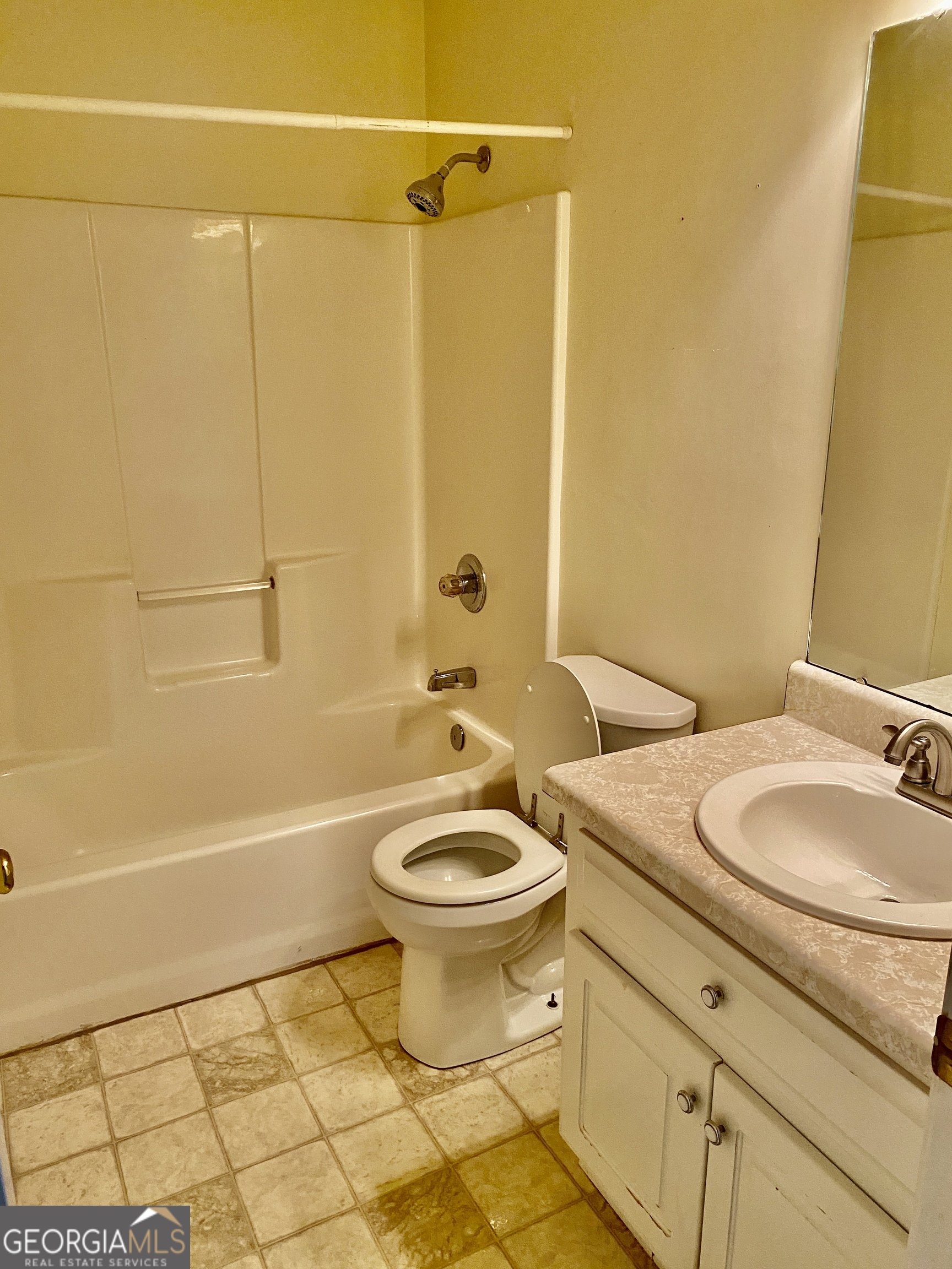 38 Boulder Drive Northwest Rome, GA 30165 - Photo 19 of 21 a bathroom with a sink a toilet and shower