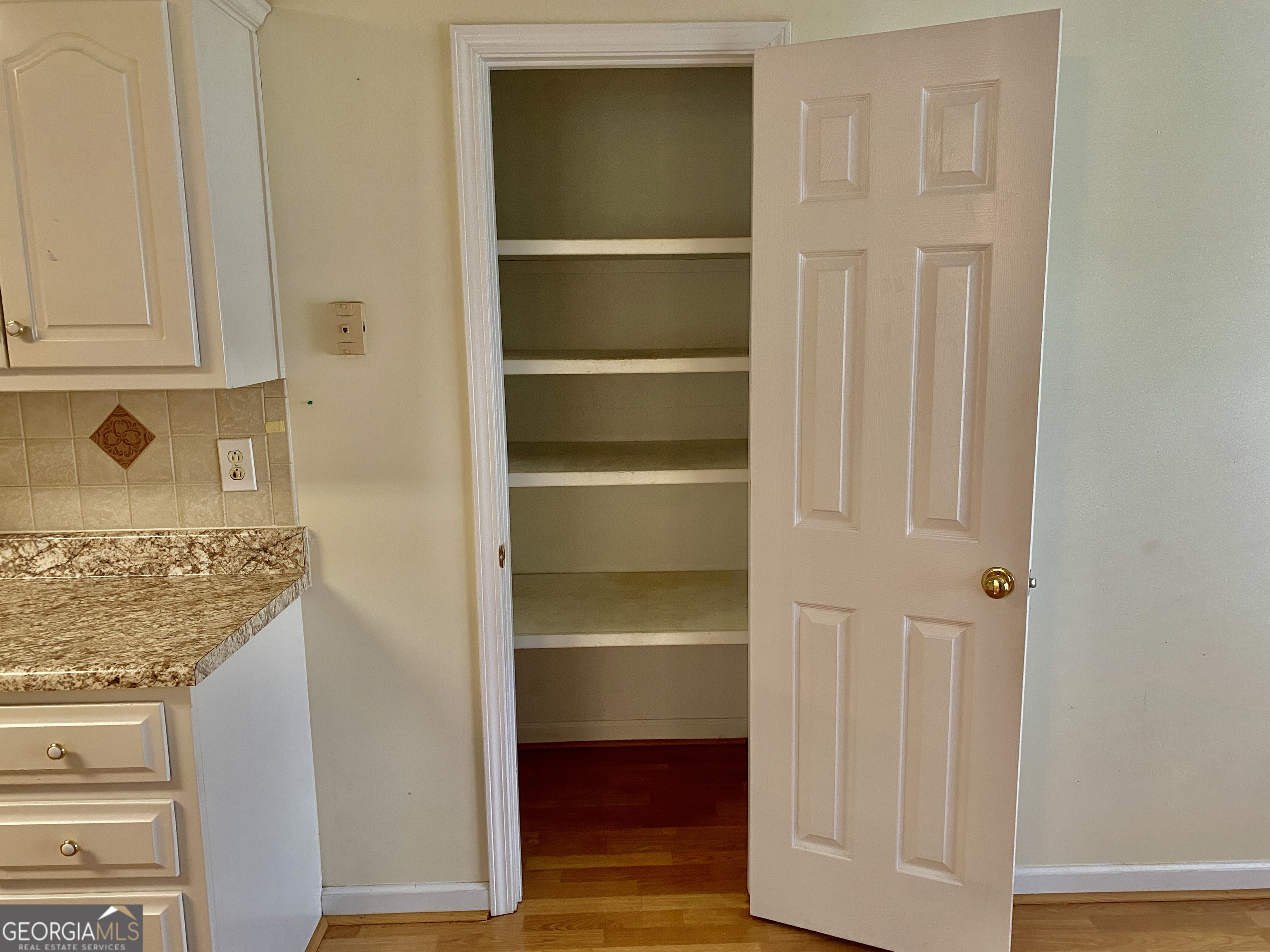 38 Boulder Drive Northwest Rome, GA 30165 - Photo 8 of 21 a view of walk in closet with empty racks
