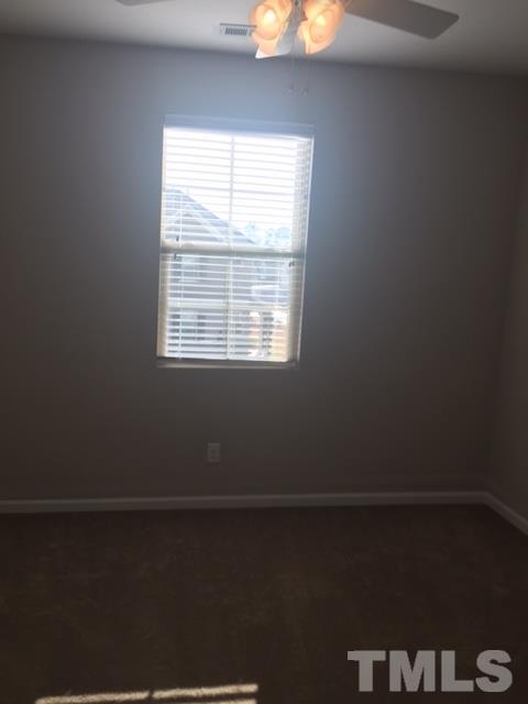 738 Wickham Ridge Road Apex, NC 27539 - Photo 20 of 23 a close up of a window