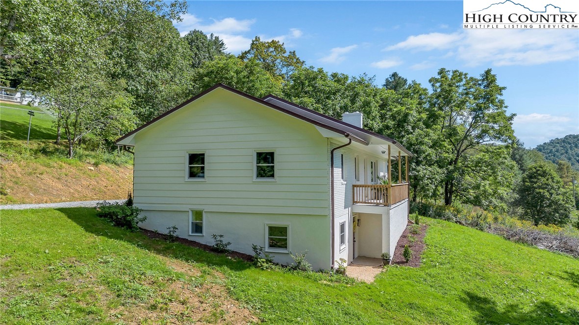 393 Carter Miller Road Todd, NC 28684 - Photo 7 of 48 a view of backyard of house with green space