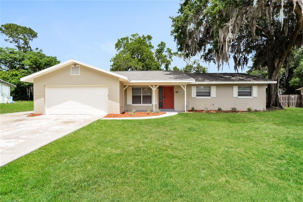 10 Catalina Drive DeBary, FL 32713 - Photo 1 of 1 a front view of house with yard and green space