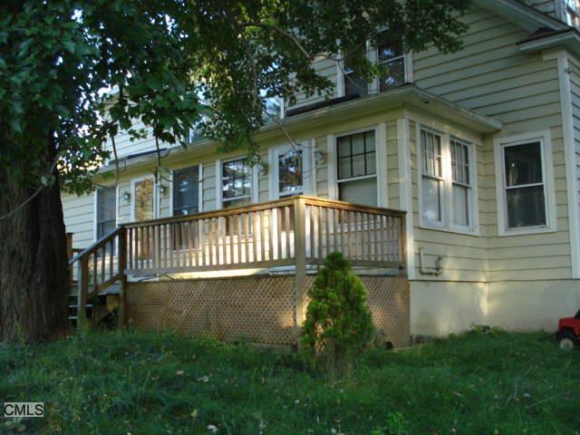80 Dodgingtown Road Bethel, CT 06801 - Photo 1 of 1 a view of a house with a yard