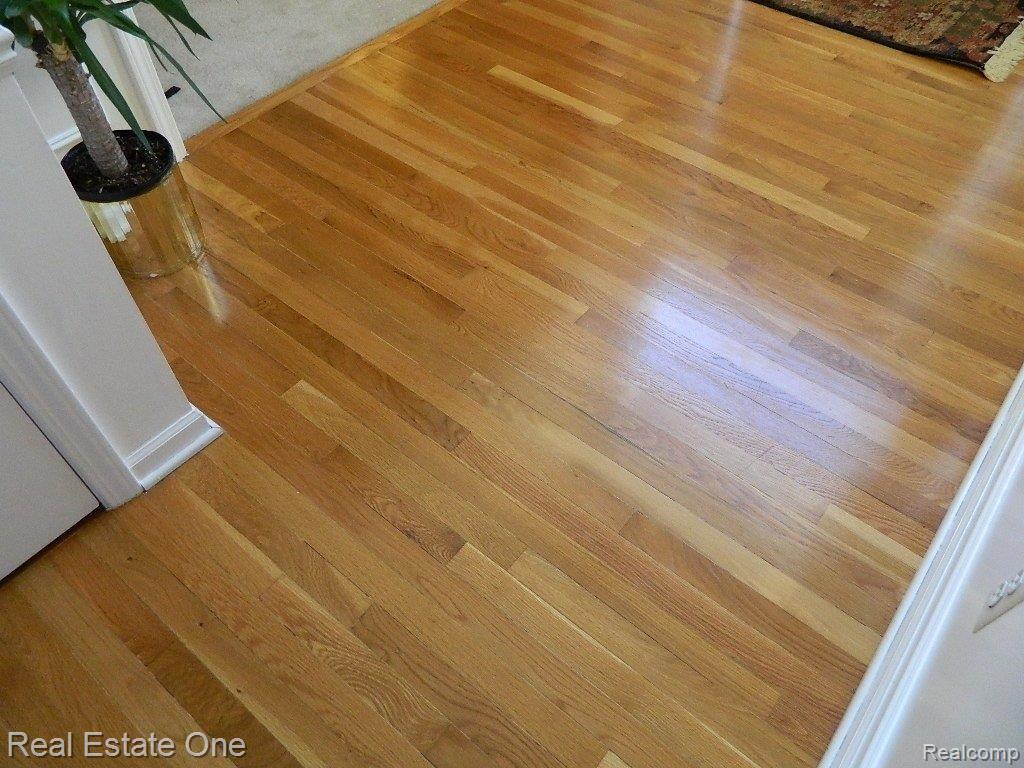 216 Saxon Court Rochester, MI 48307 - Photo 13 of 23 Refinished Hardwood Floor