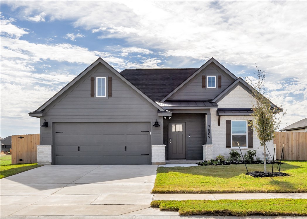 a view of a house with swimming pool and sitting area