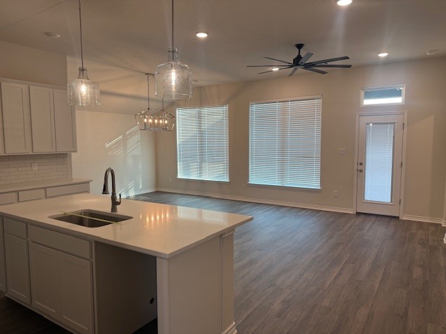 7809 Redbud Road Navasota, TX 77868 - Photo 3 of 18 a kitchen with kitchen island a sink stainless steel appliances and cabinets