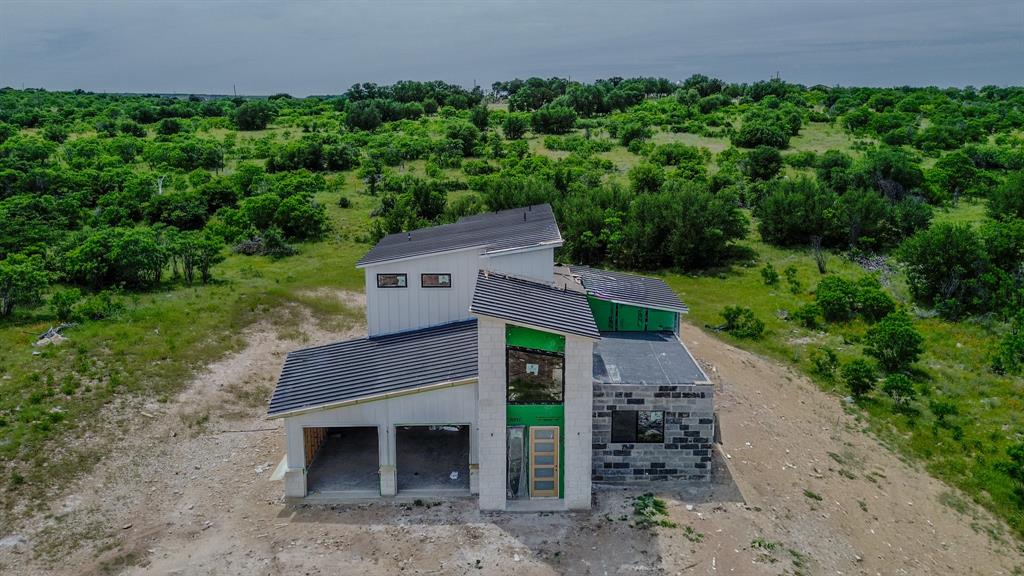 7108 Hells Gate Loop Strawn, TX 76475 - Photo 6 of 17 an aerial view of a house