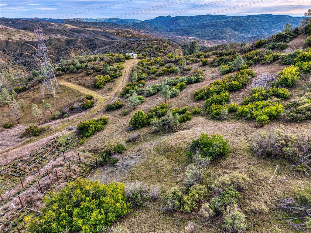 162 Mule Skinner Road Clearlake Oaks, CA 95423 - Photo 12 of 25 an aerial view of residential house and green space