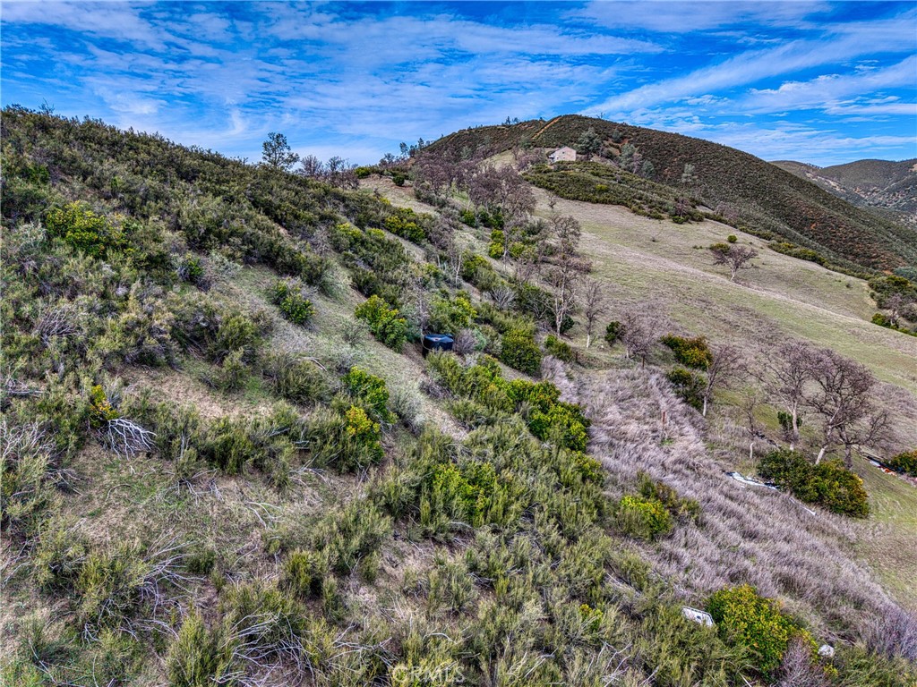 162 Mule Skinner Road Clearlake Oaks, CA 95423 - Photo 13 of 25 a view of a large mountains with a forest