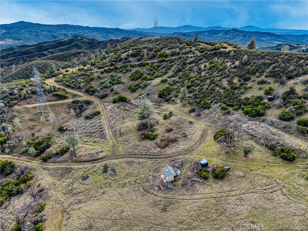 162 Mule Skinner Road Clearlake Oaks, CA 95423 - Photo 14 of 25 a view of a lake with a mountain