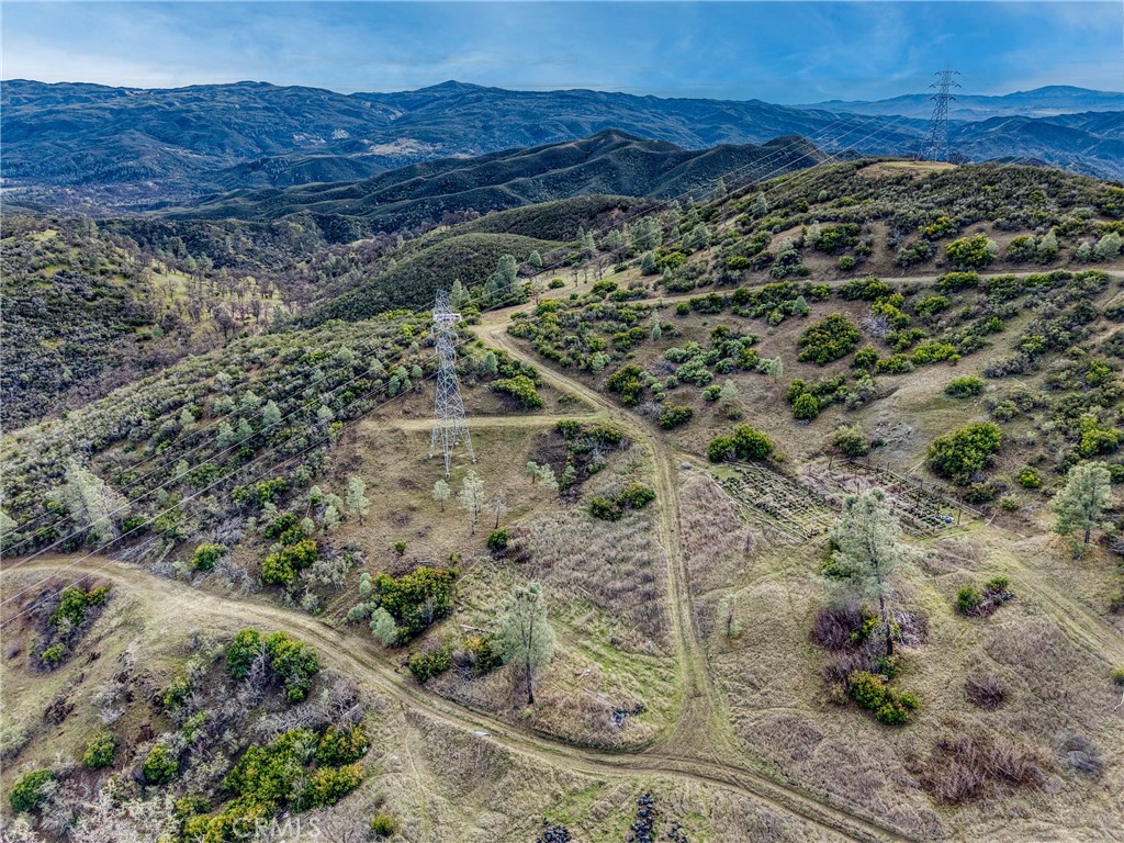162 Mule Skinner Road Clearlake Oaks, CA 95423 - Photo 16 of 25 a view of a yard with an outdoor space