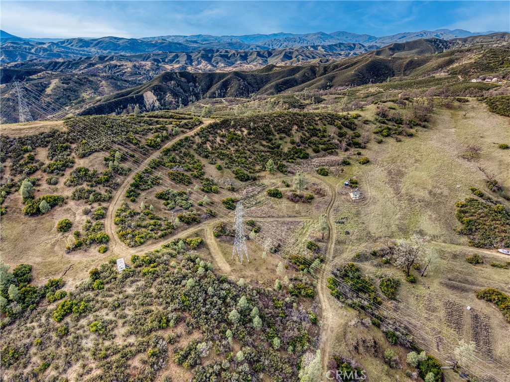 162 Mule Skinner Road Clearlake Oaks, CA 95423 - Photo 17 of 25 a view of a forest with a mountain