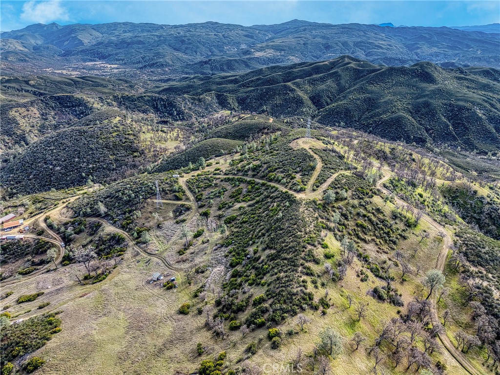 162 Mule Skinner Road Clearlake Oaks, CA 95423 - Photo 4 of 25 a view of a backyard of a house
