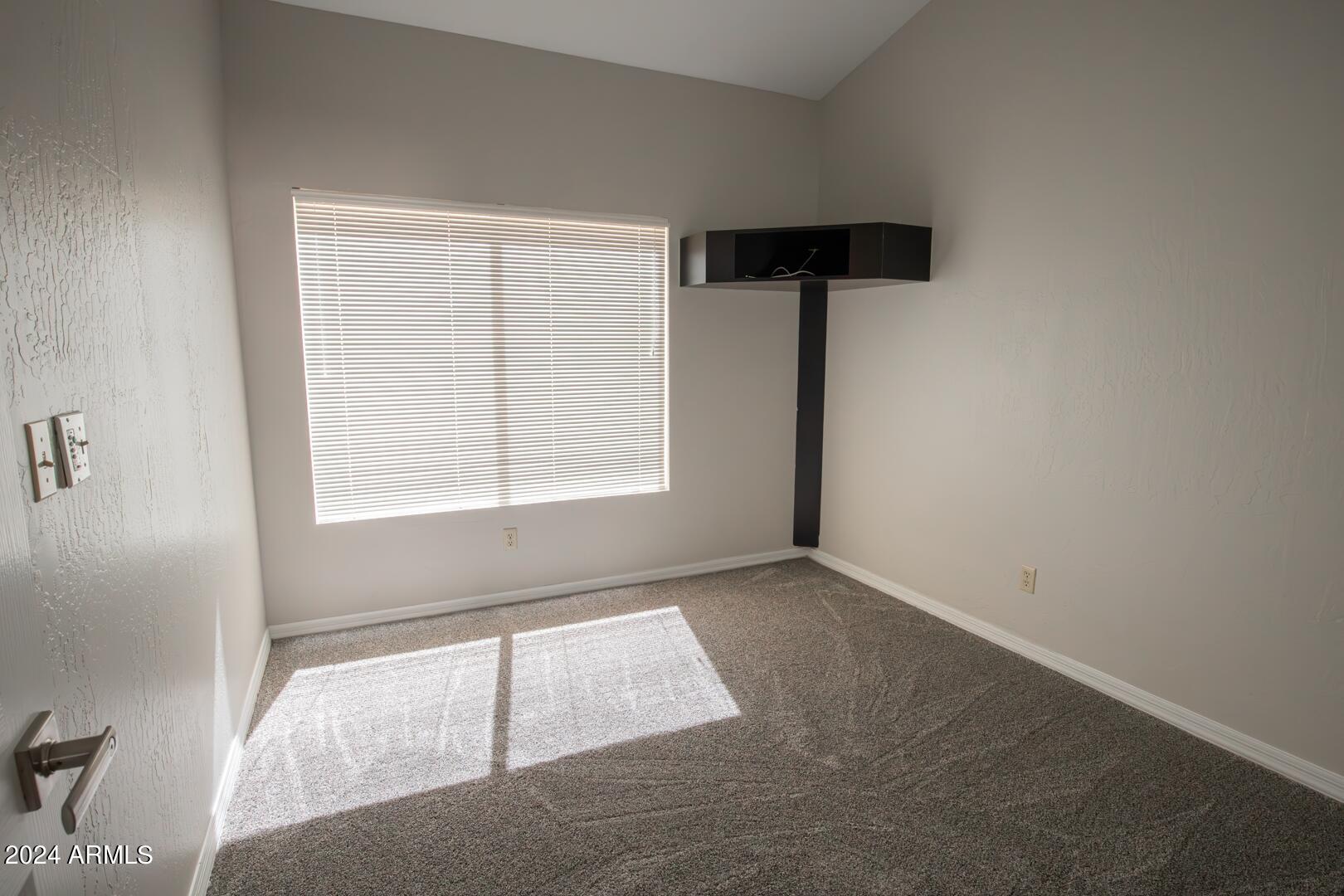 16051 South 24th Place Phoenix, AZ 85048 - Photo 33 of 42 an empty room with a window