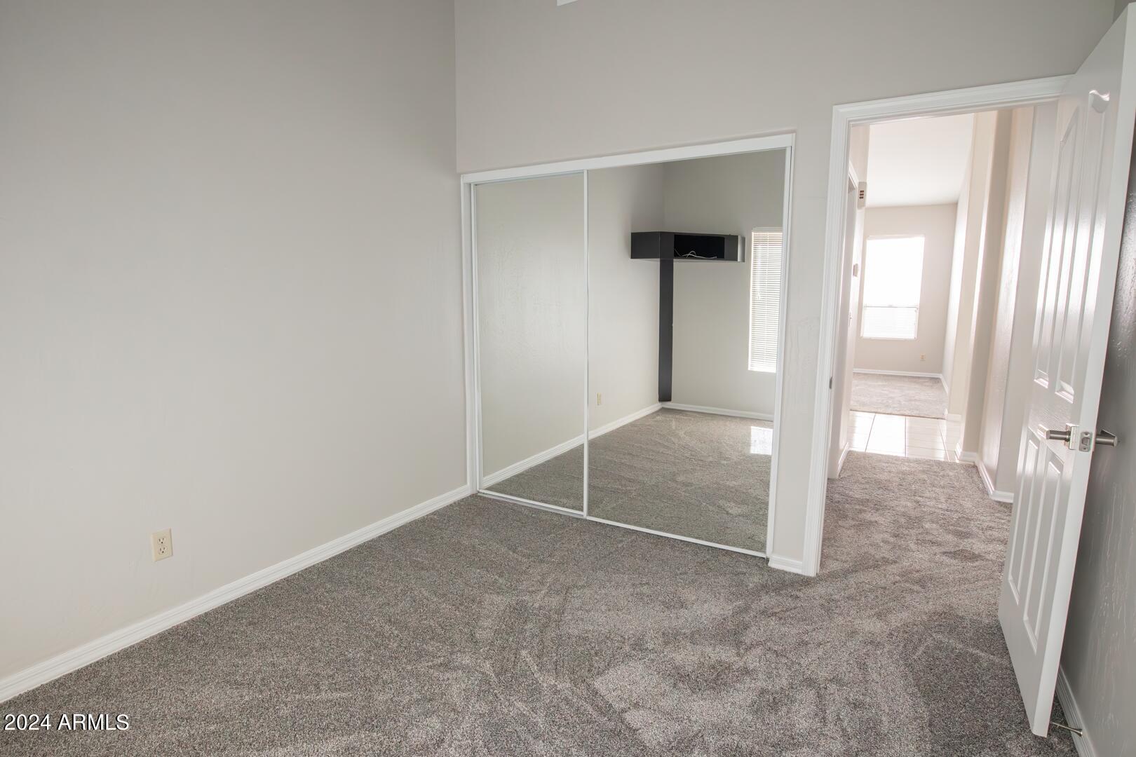 16051 South 24th Place Phoenix, AZ 85048 - Photo 34 of 42 an empty room with windows