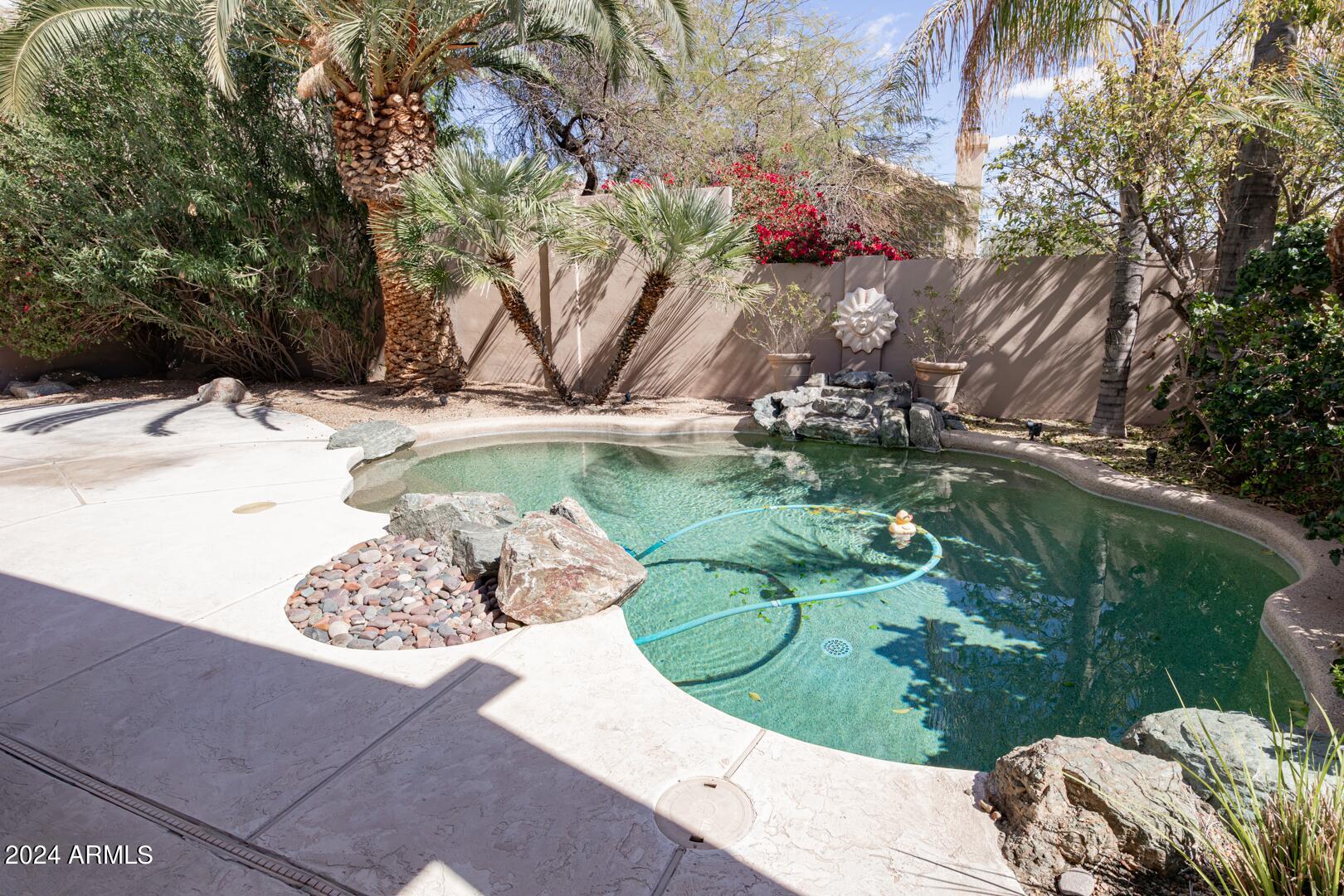 16051 South 24th Place Phoenix, AZ 85048 - Photo 39 of 42 a view of a wooden floor with a yard