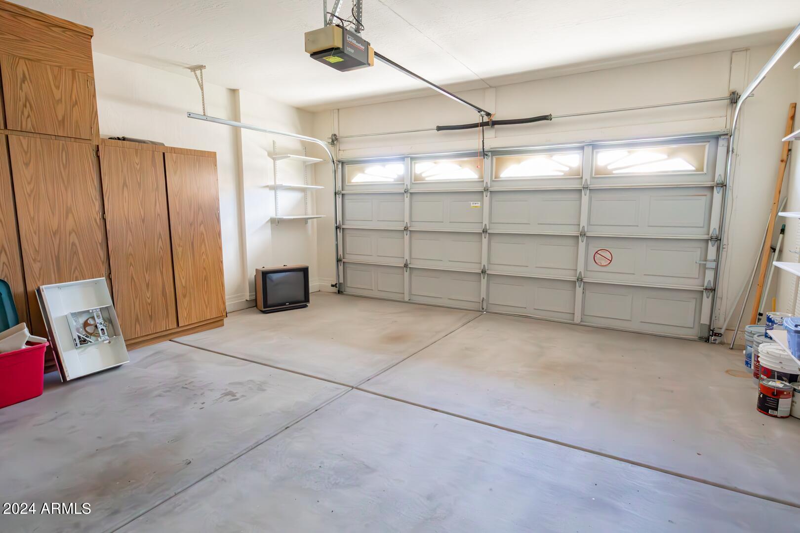 16051 South 24th Place Phoenix, AZ 85048 - Photo 41 of 42 a view of a garage