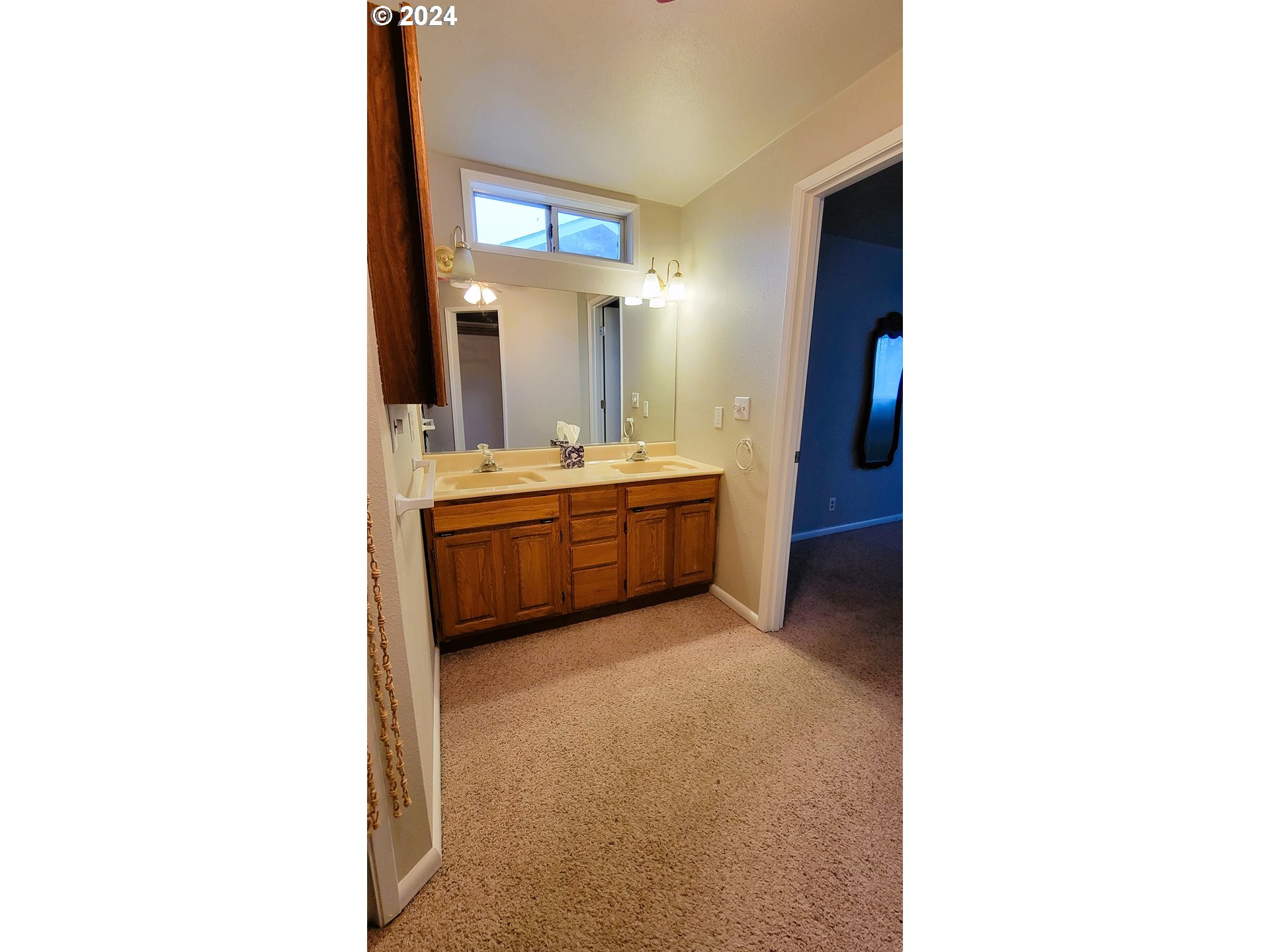 2564 Nova Street Springfield, OR 97477 - Photo 12 of 29 a view of a bathroom with sink and mirror