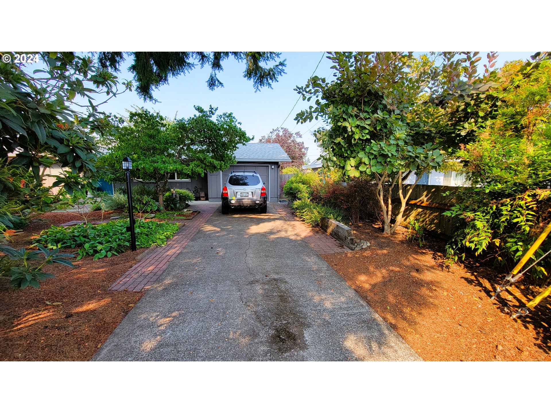 2564 Nova Street Springfield, OR 97477 - Photo 17 of 29 a open area with trees in front of it