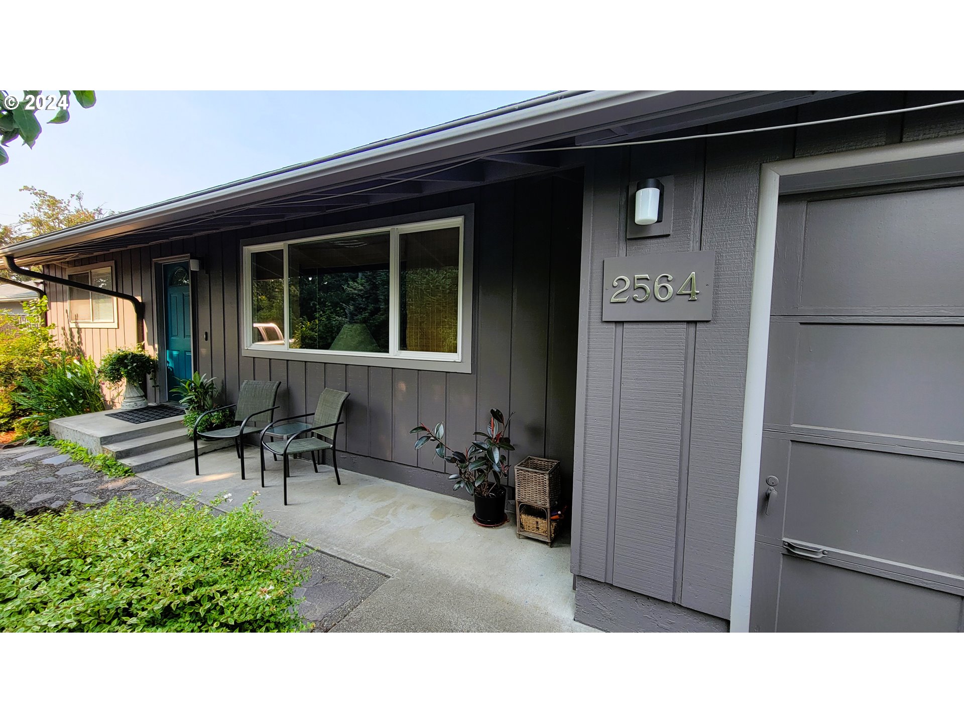 2564 Nova Street Springfield, OR 97477 - Photo 2 of 29 a black and white building with a outdoor space