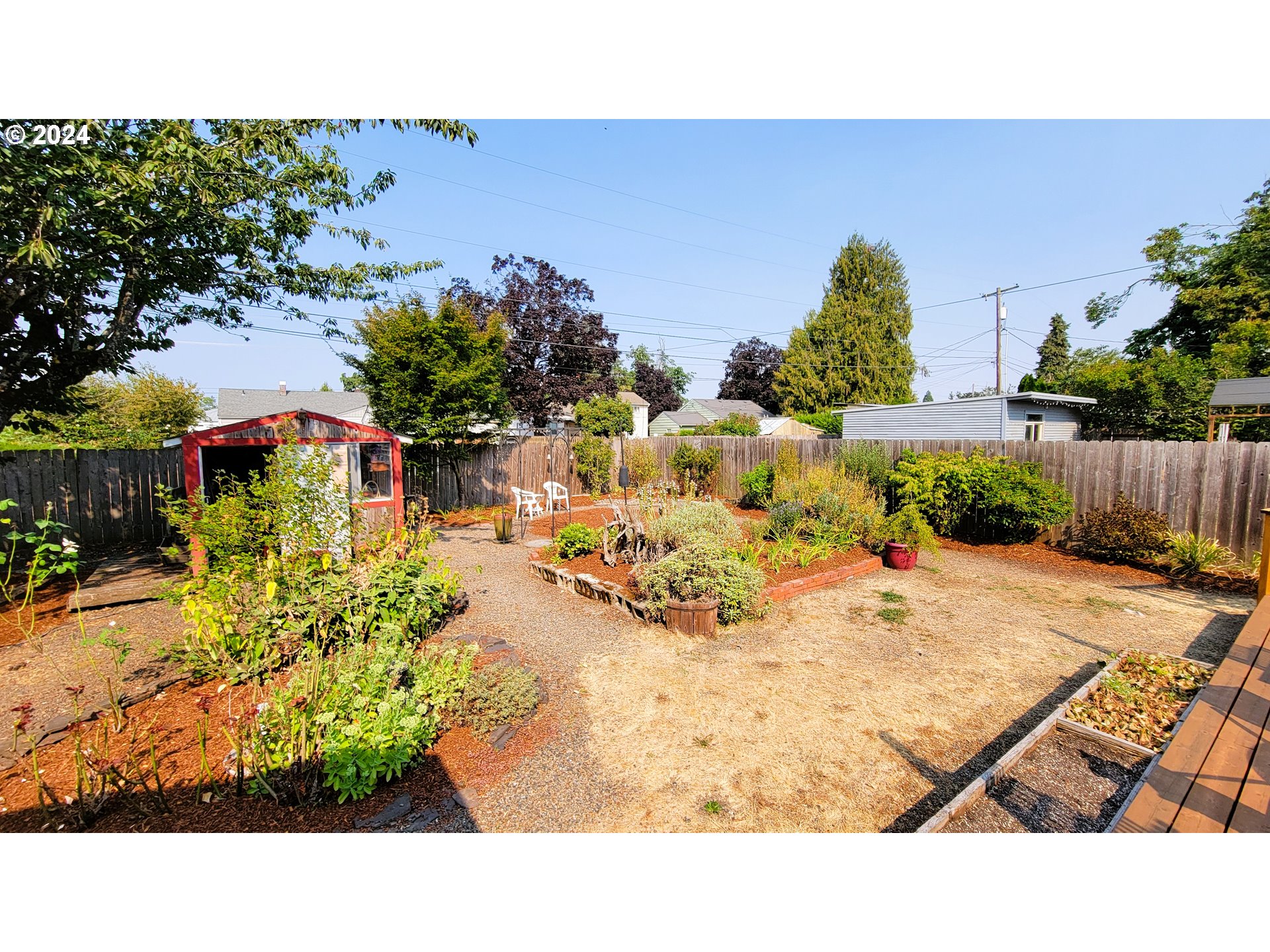 2564 Nova Street Springfield, OR 97477 - Photo 25 of 29 a view of a swimming pool with a yard