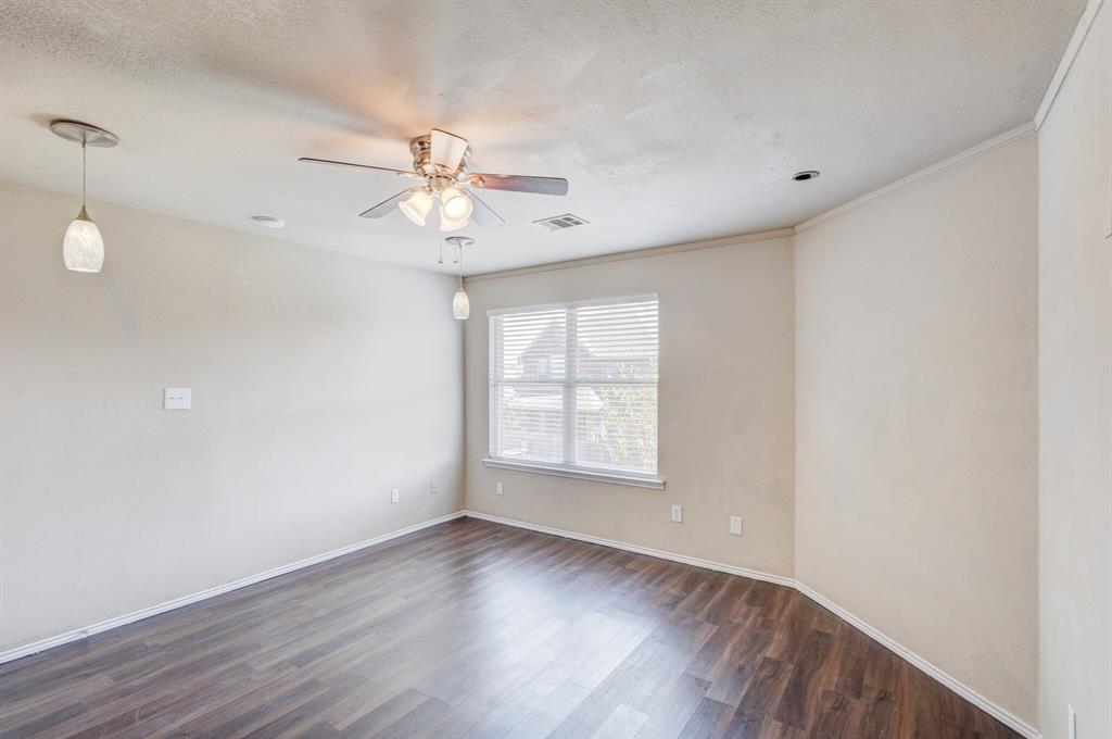 7310 Northpoint Drive Rowlett, TX 75089 - Photo 26 of 32 wooden floor in an empty room with a window