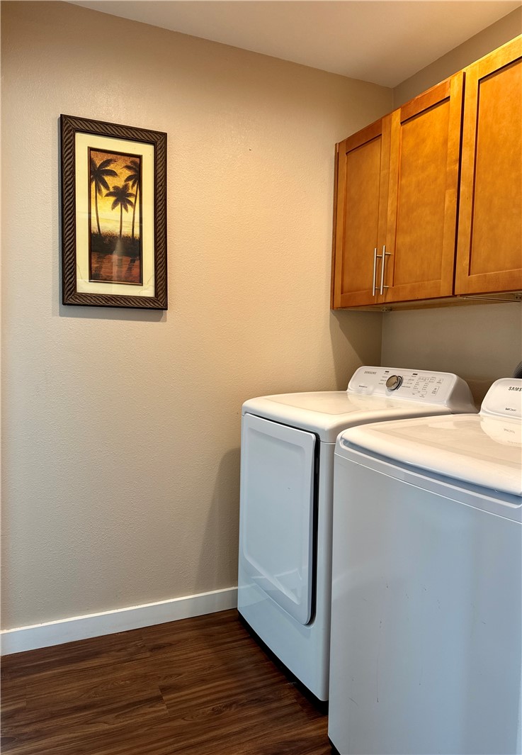 230 Cut-Off Road, Unit B107 Port Aransas, TX 78373 - Photo 16 of 25 a utility room with dryer and washer