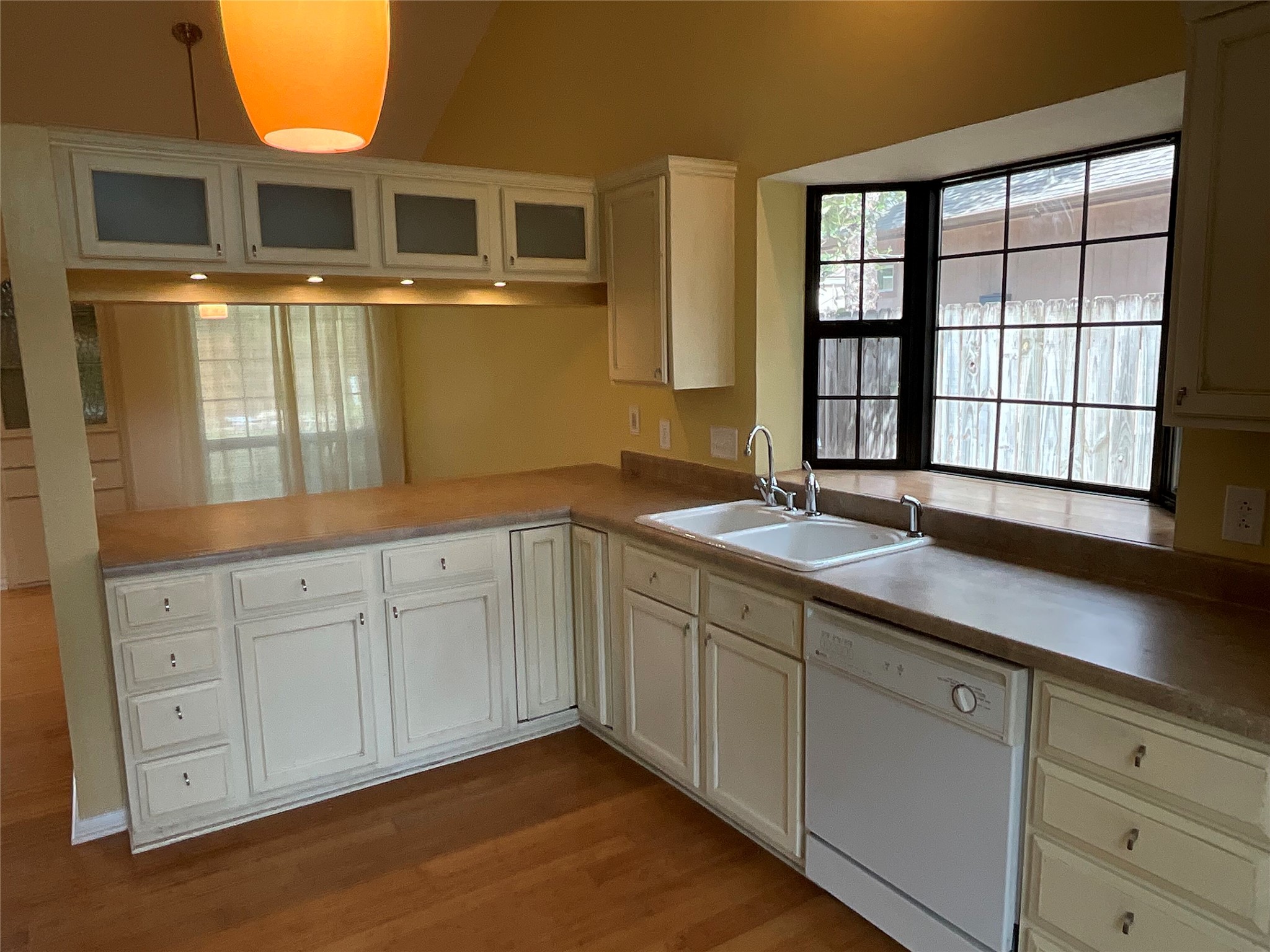 15702 Racine Cove Austin, TX 78717 - Photo 12 of 27 A well-lit kitchen with generous countertop space and an ideal window view.