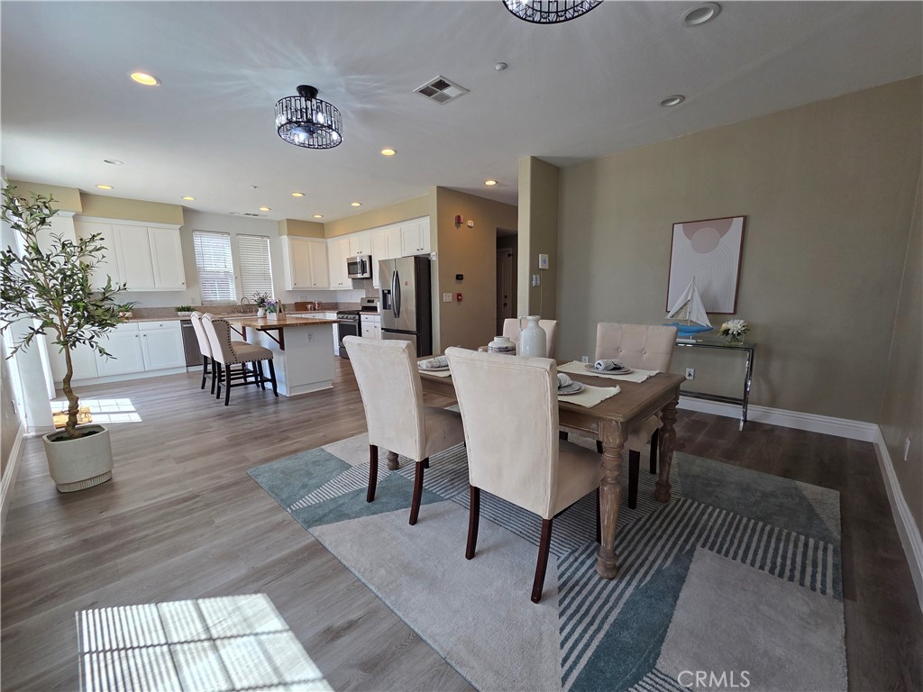 20329 Red Poppy Lane Riverside, CA 92508 - Photo 9 of 24 a view of a dining room with furniture