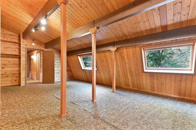 a view of swimming pool with a yard