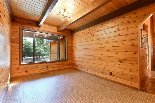 a kitchen with appliances cabinets and a stove