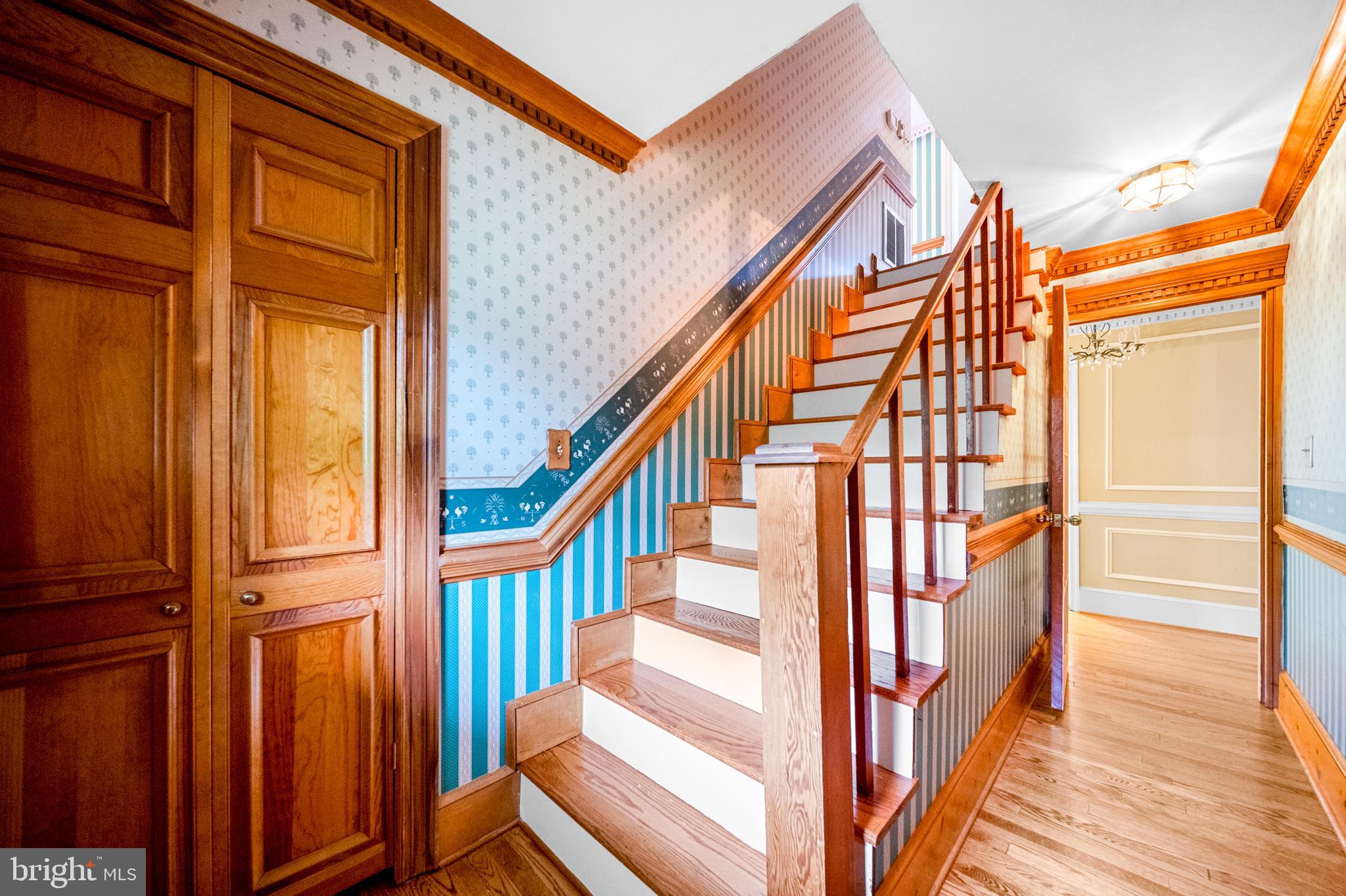18189 Sands Road Purcellville, VA 20132 - Photo 54 of 145 Hallway, closet, and stairs to upper level.