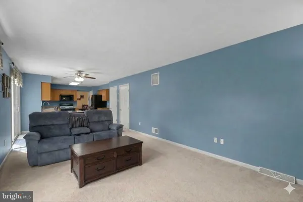 a living room with furniture and a couch