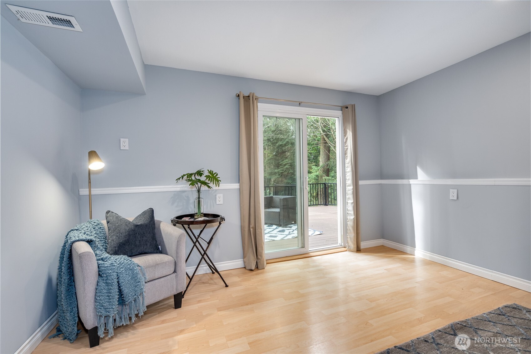 3113 198th Place Southeast Bothell, WA 98012 - Photo 17 of 32 a living room with furniture and a potted plant