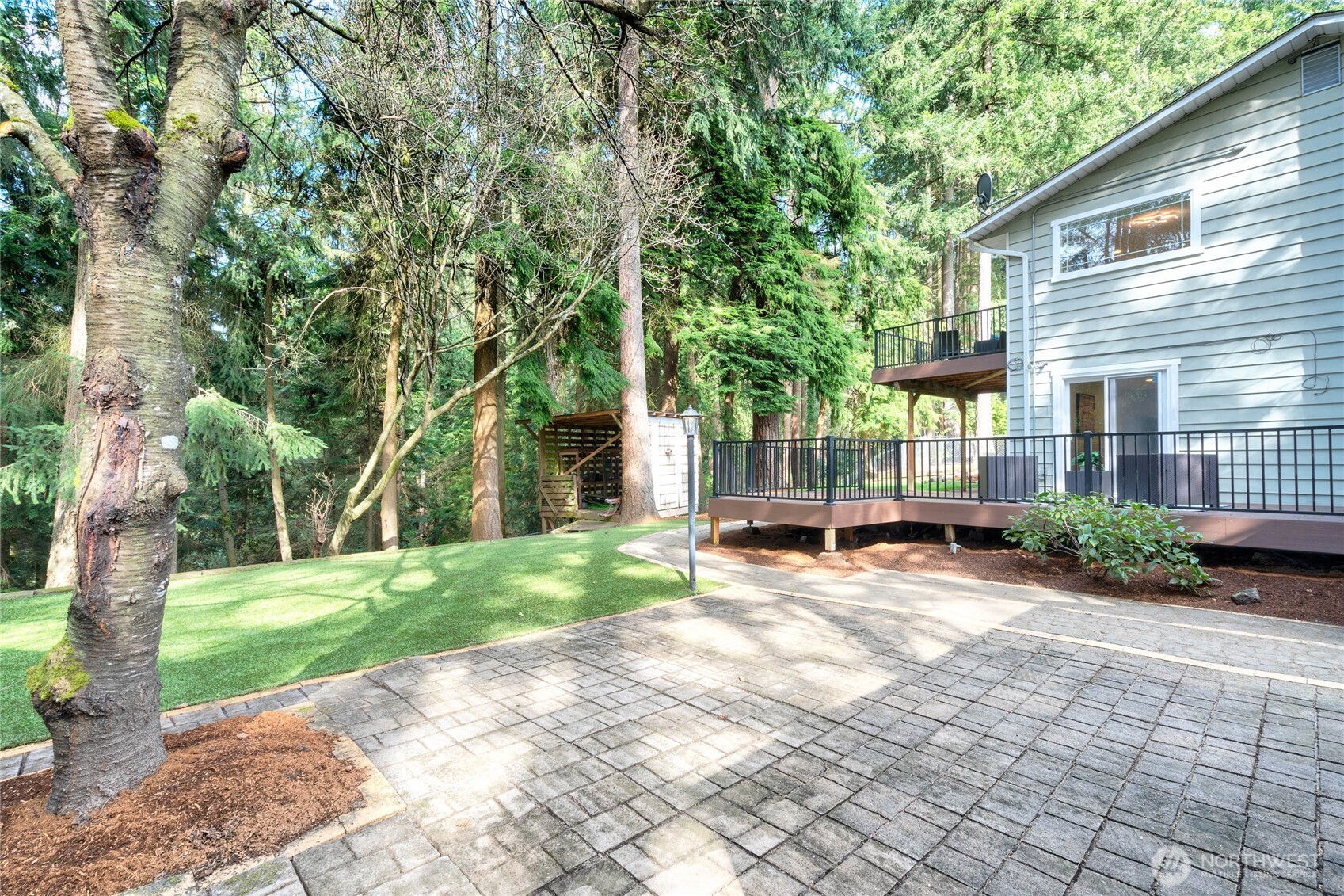 3113 198th Place Southeast Bothell, WA 98012 - Photo 25 of 32 a view of a house with backyard and sitting area