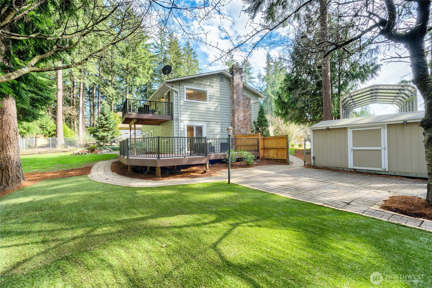 3113 198th Place Southeast Bothell, WA 98012 - Photo 26 of 32 a view of backyard with deck and outdoor seating