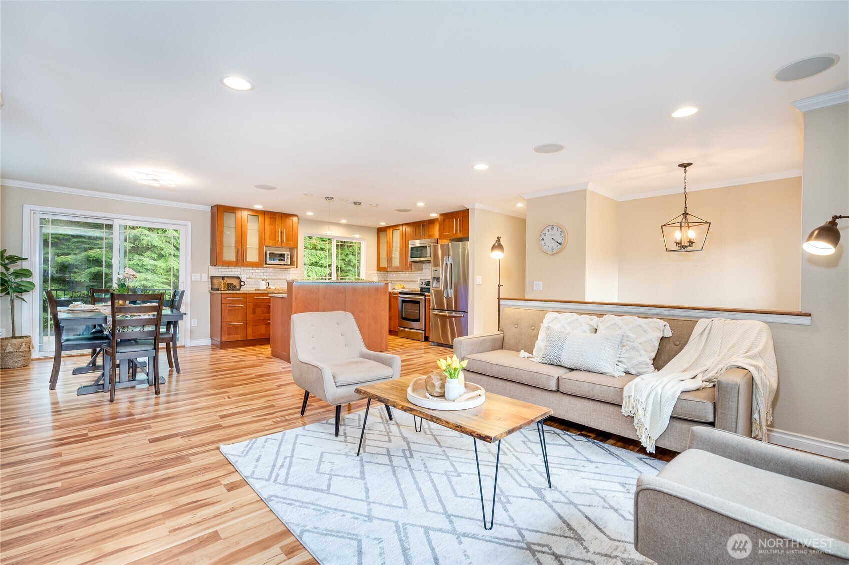 3113 198th Place Southeast Bothell, WA 98012 - Photo 4 of 32 a living room with furniture and a wooden floor