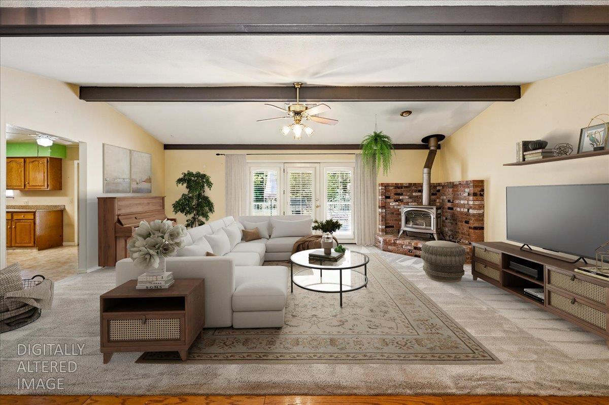12600 Friar Tuck Road Grass Valley, CA 95949 - Photo 2 of 56 a living room with fireplace furniture and a flat screen tv