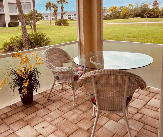 a view of a swimming pool with a lounge chair