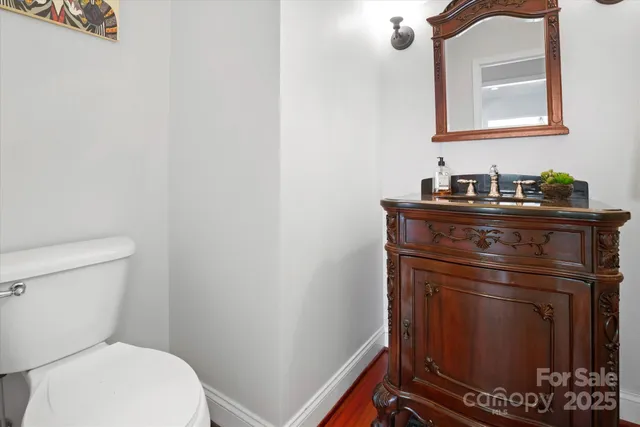 a utility room with cabinets washer and dryer