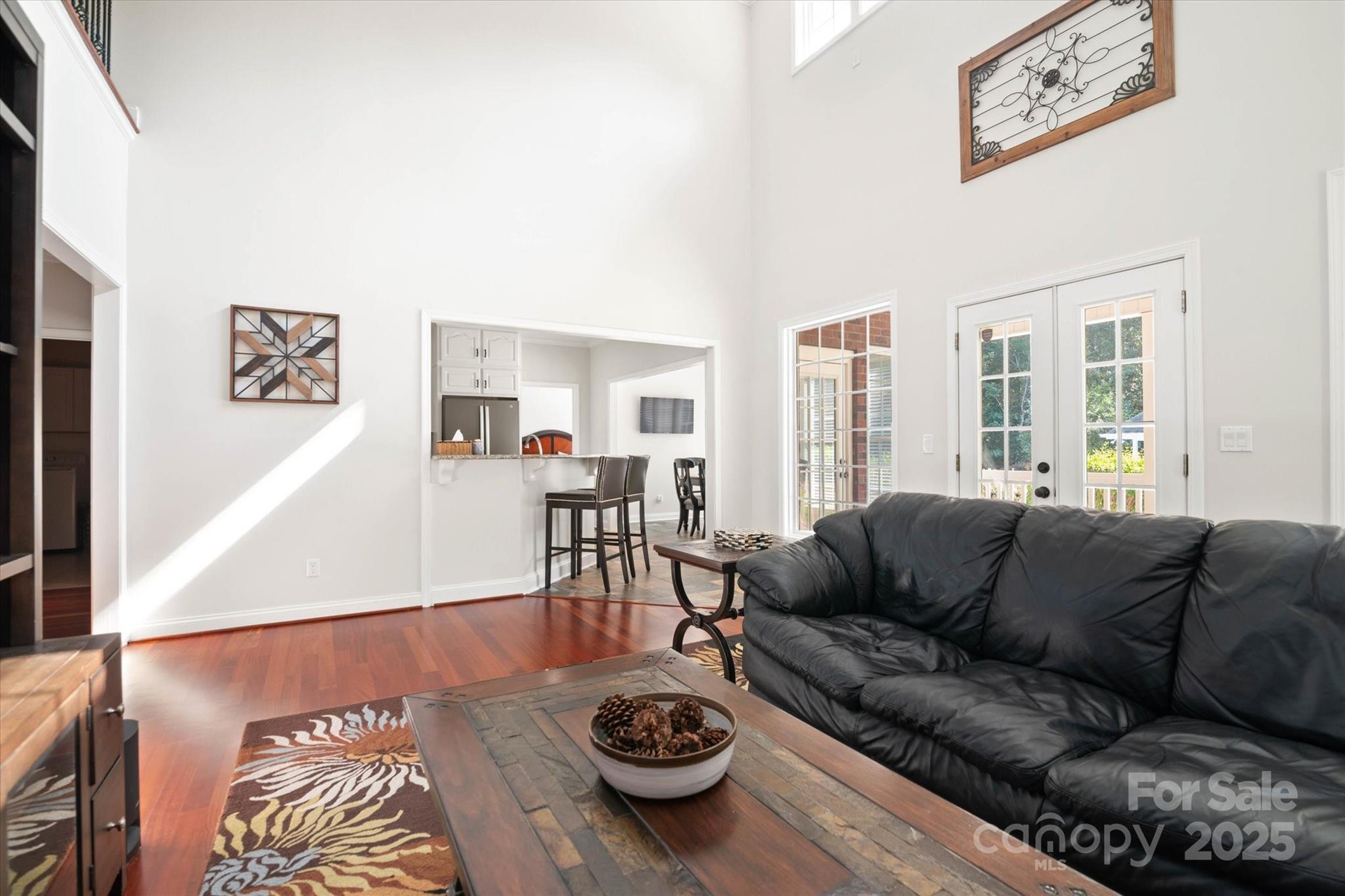 1421 Ashford Road Chester, SC 29706 - Photo 30 of 48 a living room with furniture a couch and a dining table with wooden floor