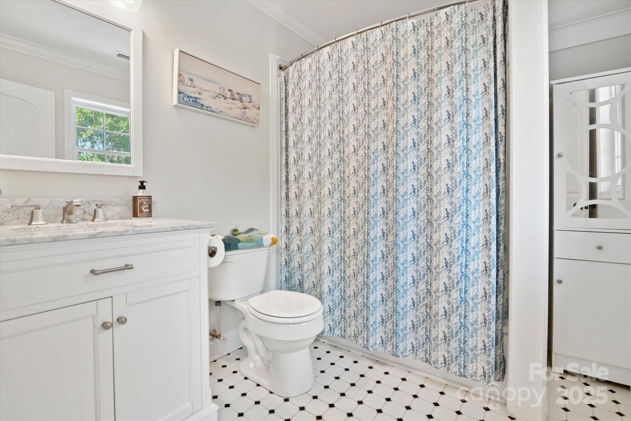 1421 Ashford Road Chester, SC 29706 - Photo 37 of 48 a bathroom with a sink toilet and shower