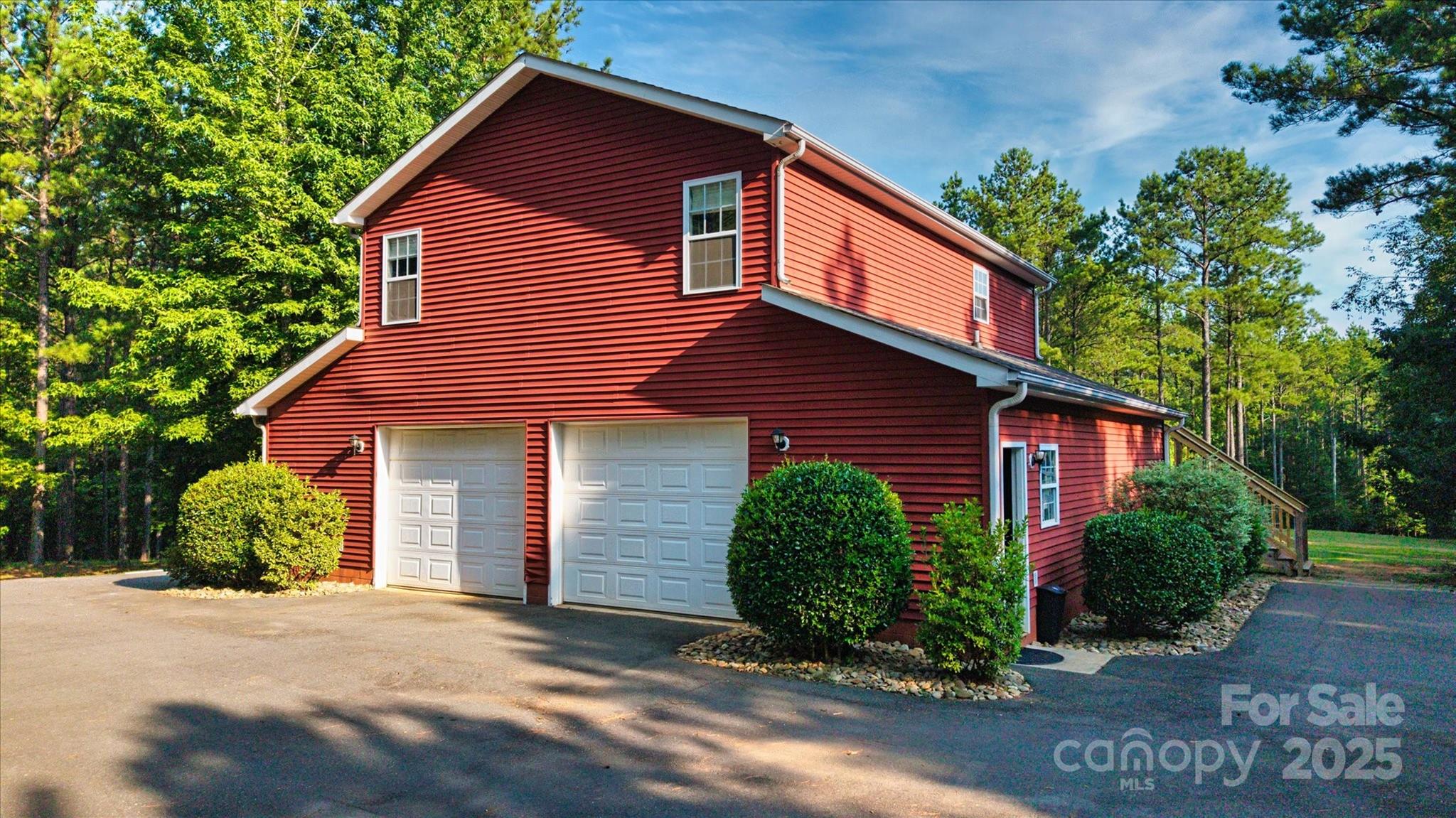 1421 Ashford Road Chester, SC 29706 - Photo 40 of 48 a front view of a house with a yard and garage