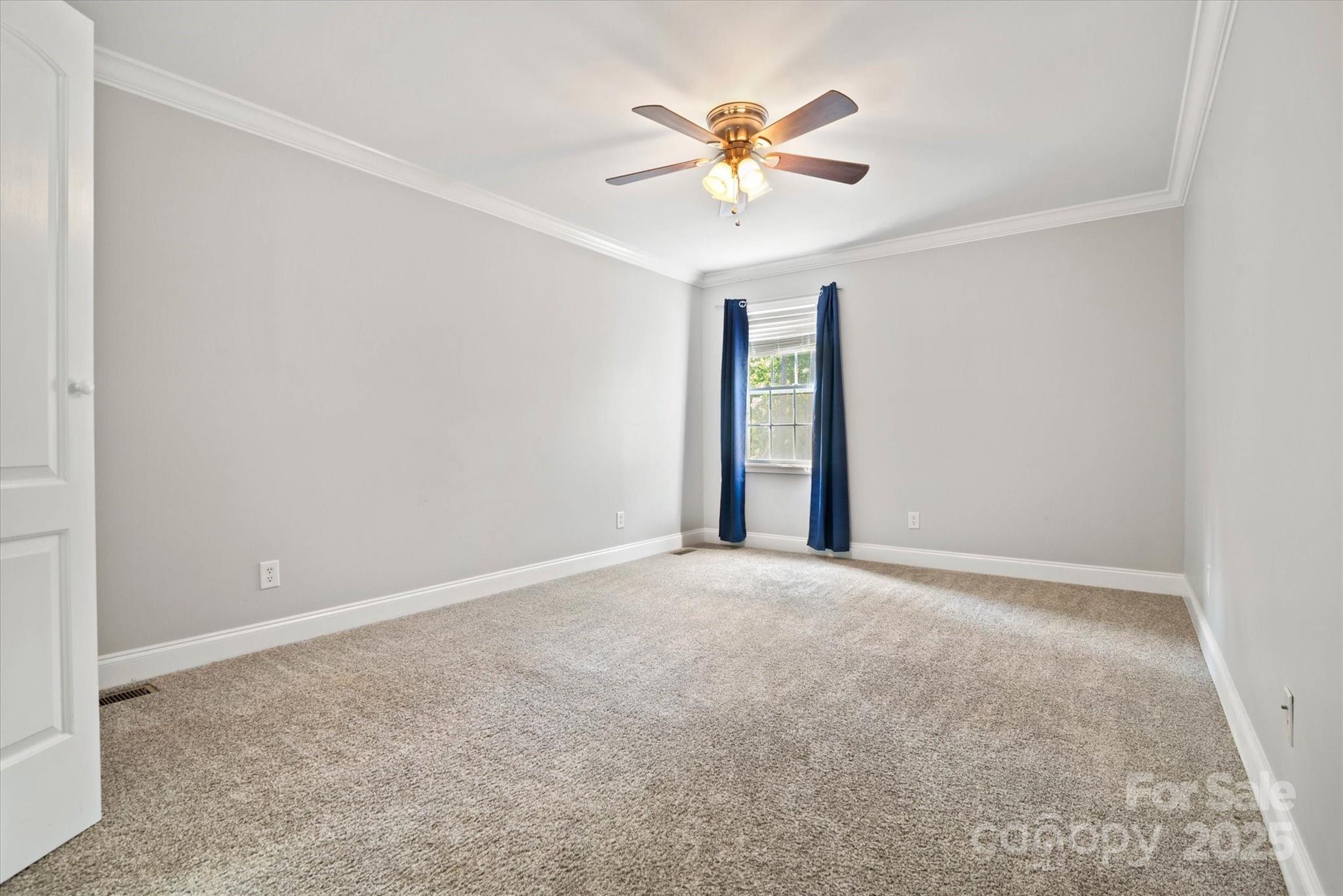 1421 Ashford Road Chester, SC 29706 - Photo 47 of 48 a view of an empty room with a chandelier fan