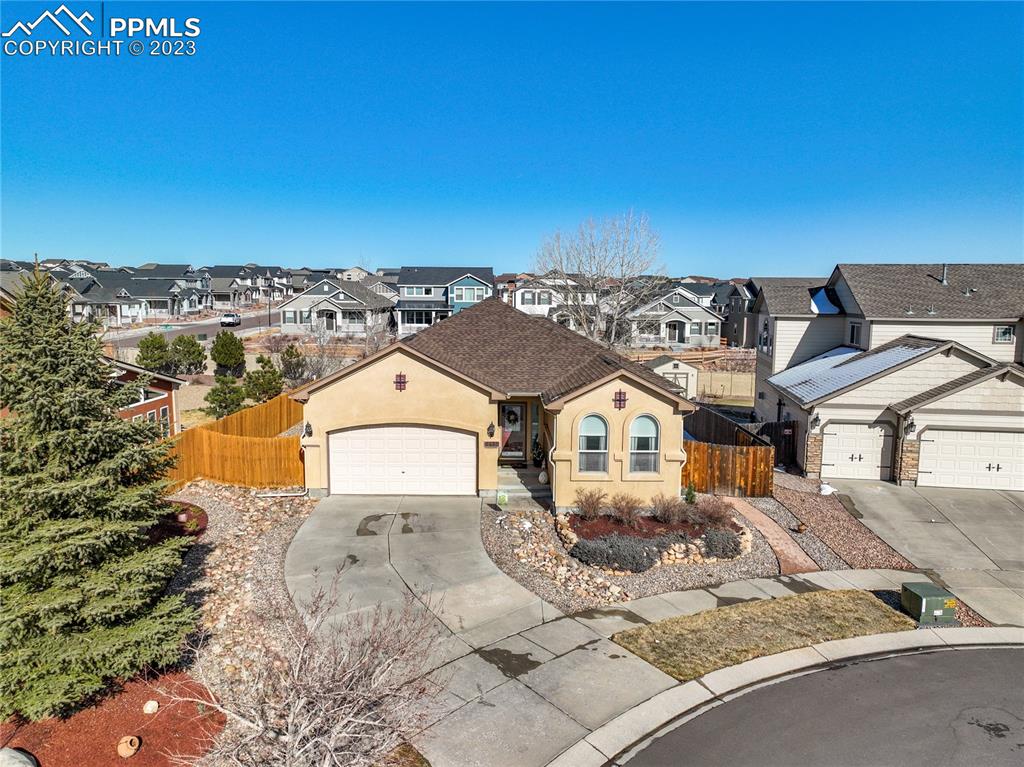 6435 Coyote Ridge Court Colorado Springs, CO 80923 - Photo 2 of 50 an aerial view of a house